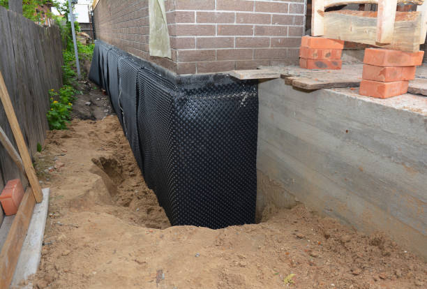 Happy homeowners after waterproofing job in Fortescue